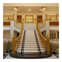 This grand staircase, with its marble steps and custom gilded balustrade, serves as a central, sculptural element in a luxury residence. It exemplifies our approach to integrating opulent details into functional home design.