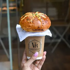 A true love story: our freshly brewed coffee alongside a warm, savory Korean Cream Cheese Bun. It's the perfect pair to start your day or for a mid-day break.