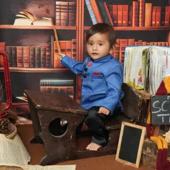 Ready for the first day of school. This library or "school time" theme is perfect for curious little ones. The vintage desk, books, and chalkboard create a charming scene.