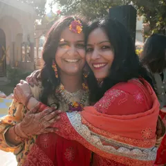 A warm, heartfelt hug between the bride and her sister or best friend during the haldi ceremony. These are the moments to cherish.