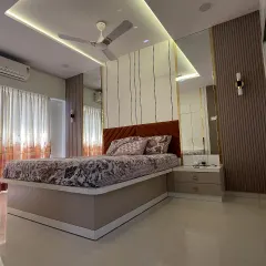 Your bedroom should be your ultimate retreat. In this space, I used a blend of soft lighting, luxurious textures, and clever mirror placements to create an ambiance of serene sophistication. The result is a peaceful haven for rest and rejuvenation.