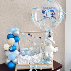 Welcoming a new baby boy is a huge deal, and this hamper is designed to match the occasion. We created a custom wooden clothing rack filled with baby essentials, complete with a personalized "Welcome to the World" balloon arrangement in shades of blue and silver.