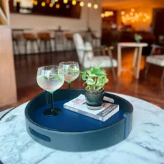 Looking for a thoughtful and stylish housewarming gift? The Bella Pelle Casa Bar Tray, with its deep navy leather and clean lines, brings a touch of elegance and sophistication to any home.