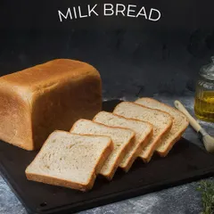 Our milk bread is incredibly soft and fluffy, perfect for sandwiches or just enjoying on its own with a bit of butter.