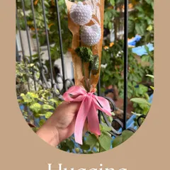 Introducing my "Hugging Tulips," a simple yet sweet arrangement of two white crochet tulips. They are wrapped neatly with a pink ribbon, making them an adorable and thoughtful gift for someone special.