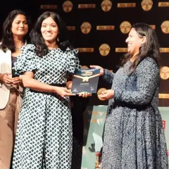 A wonderful moment on stage receiving my award. I'm so grateful to Homebakers.co.in for providing such a great platform for bakers like me.