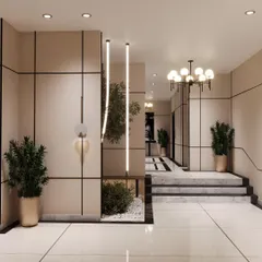 Modern elegance redefined with a blend of greenery, minimalism, and luxury lighting. The vertical tube lights create a striking visual feature in this inviting interior.