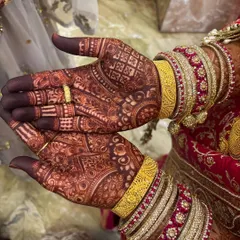 Here you can see the beautiful, deep red stain that develops from my all-natural, organic henna. This is the result 48 hours after application, perfectly complementing the bride's engagement jewelry and attire. A rich stain is my promise to every bride.