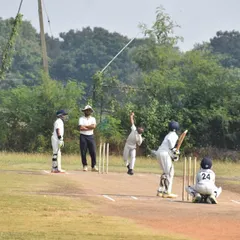 A batsman faces a delivery during a competitive match in Hyderabad, gaining valuable experience against new opposition.