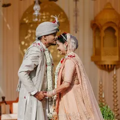 A tender forehead kiss. These are the quiet, intimate moments that we ensure are captured amidst all the wedding chaos.