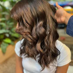 From Miss to Mrs. with this beautiful wedding hair. A deep, rich brunette with subtle highlights, this non-bleach color is perfect for a classic bridal look.