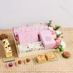 An elegant dessert hamper, thoughtfully curated with a selection of our finest handcrafted treats and fresh flowers. It’s the perfect way to share joy and celebrate life’s sweetest moments.