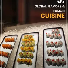 This image highlights my expertise in global flavors and fusion cuisine, featuring three different types of vegetarian sushi on a bed of ice.