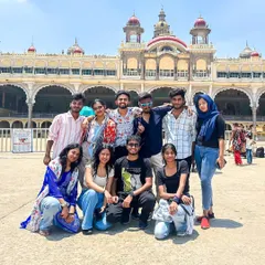 The group posing in front of the magnificent Mysore Palace. A must-see landmark and a highlight of our city tour.