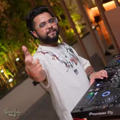 Interacting with the crowd at Perissa Aravali. A good DJ connects with the audience, and I make sure to bring that personal touch.