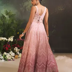 The back of the Celine Gown, showcasing the beautiful ombre effect and the elegant lace-up detail.