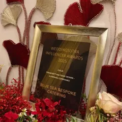 Honoured with the Gold award for Trendsetting Food Design by the WeddingSutra Influencer Awards 2025. This recognition, displayed amongst beautiful decor, affirms our passion for culinary innovation.