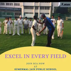 "Excel in every field." A coach provides guidance to young players at our Sumermal Jain Public School center, reinforcing our commitment to raising achievers.