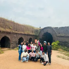 The camaraderie of the trek is one of the best parts. Here's a happy group from a recent Kumaraparvatha trip, celebrating their achievement at the historic fort entrance on the trail.