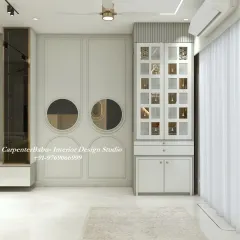 A modern puja cabinet with jali-patterned doors, integrated into the living room design. This is a perfect solution for creating a sacred space in a compact apartment.
