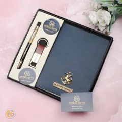 A beautiful gift set for a professional, including a personalized diary, pen, and keychain, all with custom names and charms.