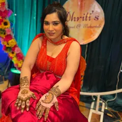 A lovely portrait of a client during her sangeet and mehendi event. Her beautiful henna is the perfect accessory for her festive look.