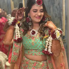 A beautiful, vibrant Haldi look, the second of three transformations for this lovely bride.