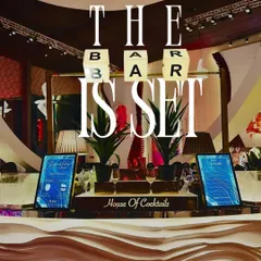 The bar is set and ready for action. This setup features a modern, wave-textured bar front, digital menu screens for easy ordering, and illuminated letter blocks that make a bold statement.