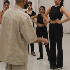 Here I am breaking down the choreography for my students. My focus is always on clear instruction and creating a supportive space where everyone feels comfortable asking questions and learning the details.