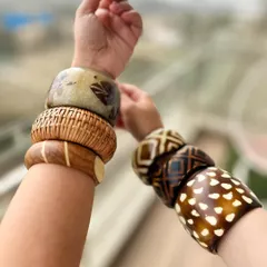 Another angle of my bangle stack. Mixing different patterns, textures, and widths creates a visually interesting and personalized accessory statement.