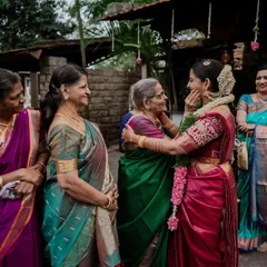An emotional moment as the bride is embraced by her family. These are the priceless, candid memories that we are honored to capture.