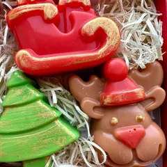 Another festive Christmas soap box, this one including Santa's sleigh, Rudolph, and a Christmas tree.