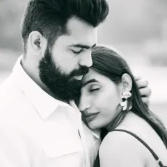 A tender black and white pre-wedding portrait, capturing a quiet and intimate moment between the couple.
