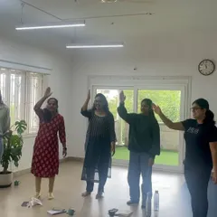 Waving hello is the action we use for the 'h' sound. This interactive, movement-based approach is a core part of my phonics workshops, making learning active and engaging.