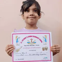 Another happy picture of our award-winner, Tanvi. Her smile says it all! We celebrate every achievement, big or small.