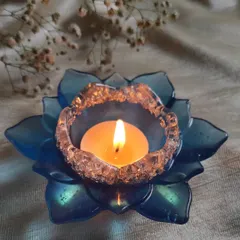 The blue lotus T-light holder, perfect for adding a pop of color to your festive decorations. I can make these in any color you like.