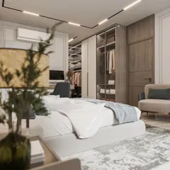 A look at the open-style wardrobe integrated into the bedroom design. This solution offers easy access to clothes and accessories while adding to the room's modern, open feel.
