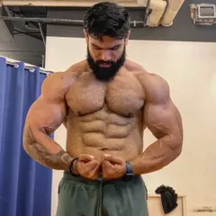 This is the condition we aim for five weeks out from a competition. The focus is on achieving extreme leanness and muscle fullness, showcasing deep abdominal separation and vascularity. This stage of contest prep is critical for dialing in the final look.