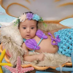 Let's create some magic. This little mermaid theme is one of my favorites. I love bringing fantasy worlds to life for your baby, with handmade outfits and detailed setups.