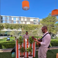 A daytime garden party in Dubai where I collaborated with a live guitarist. The blend of electronic beats and acoustic guitar created a perfect, chilled-out vibe.