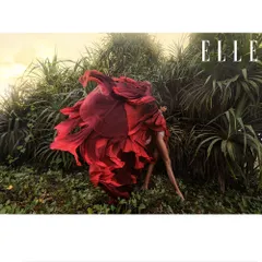 A powerful, wide-shot from my Elle India editorial. The explosive movement of the red fabric against the lush green backdrop creates a moment of pure visual drama, capturing the untamed energy of the monsoon season.