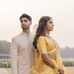 Of fate that whispered, timing that aligned, and a love that spoke louder than words. A classic, beautifully composed portrait from an outdoor pre-wedding session, capturing a moment of quiet connection.