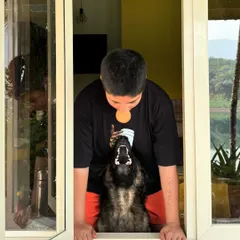 These are the quiet moments that matter. Here's me and Floyd just hanging out, sharing a moment. This is the kind of relaxed, affectionate environment your dog will experience.