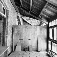 A raw interior space in a new project. The exposed brick and wooden roof structure provide the historical canvas upon which we will begin the process of surgical intervention and architectural dialogue.
