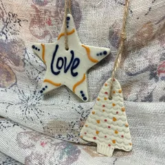 This 'Love' ornament set is painted with a deep blue, offering a different color variation for your holiday decor.