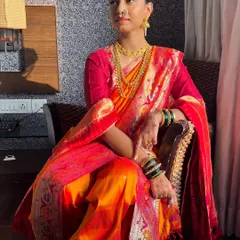 A beautiful bride, Apoorva, in her full Maharashtrian wedding attire. It was a joy to drape her in this vibrant Nauvari saree, ensuring every detail was perfect for her special day.