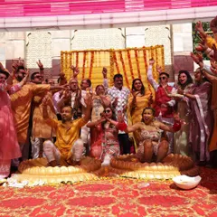 A happy groom enjoying his Haldi ceremony with family. I styled him in a simple yet elegant yellow kurta, a comfortable and practical choice that still looked great in photos.
