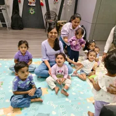 Here I am with some of my wonderful students. Creating a warm, nurturing space where every child feels seen and comfortable is the most important part of what I do.