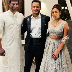 Posing with the happy couple, Dhanush and Soundarya, at their sangeet. It's a privilege to be part of their special day and help them create memories that will last a lifetime.