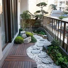 A perfect zen garden retreat, right on your balcony. We combined natural wood decking with a winding pebble pathway and carefully placed bonsai and shrubs to create this peaceful escape from the city buzz.